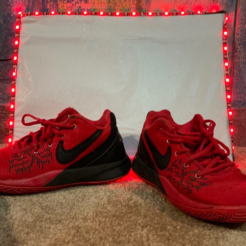Used red Kyrie flap trap 2’s
